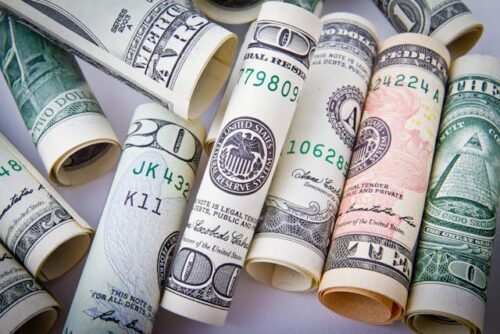 rolled dollar bills